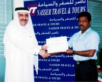 Mr.Nasser  Presenting "Certificate of Appreciation" to Mr.Madhumohan